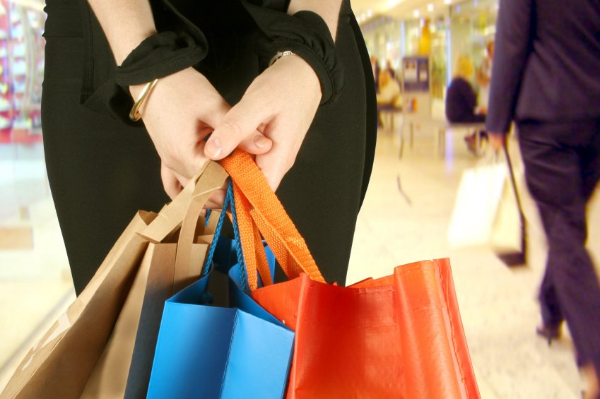 business girl with shopping bags