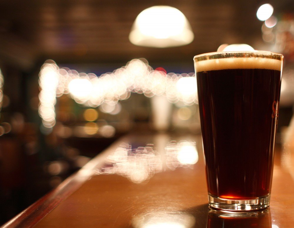 dark beer on bar_63902653