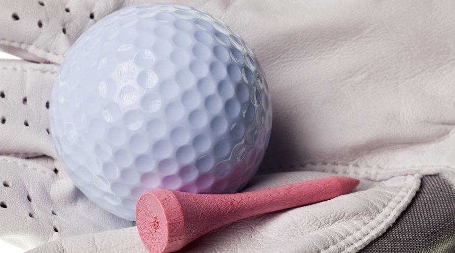 golf ball and pink tee for the ladies day to play golf event