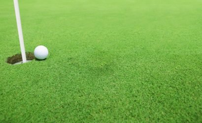 golf tournament with a golf ball on green grass