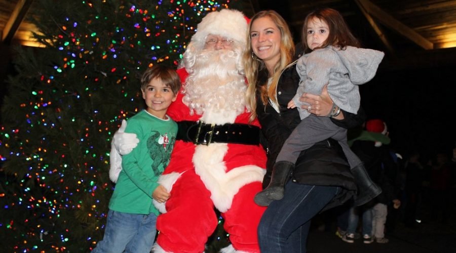 Santa Clause with two children and mom