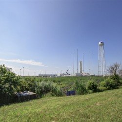 Launch pad with large water tower and lightning towers