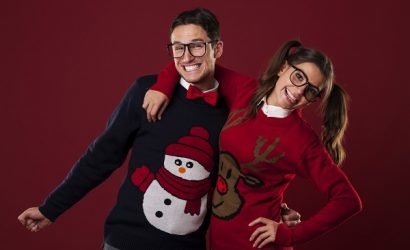 couple in ugly christmas sweaters