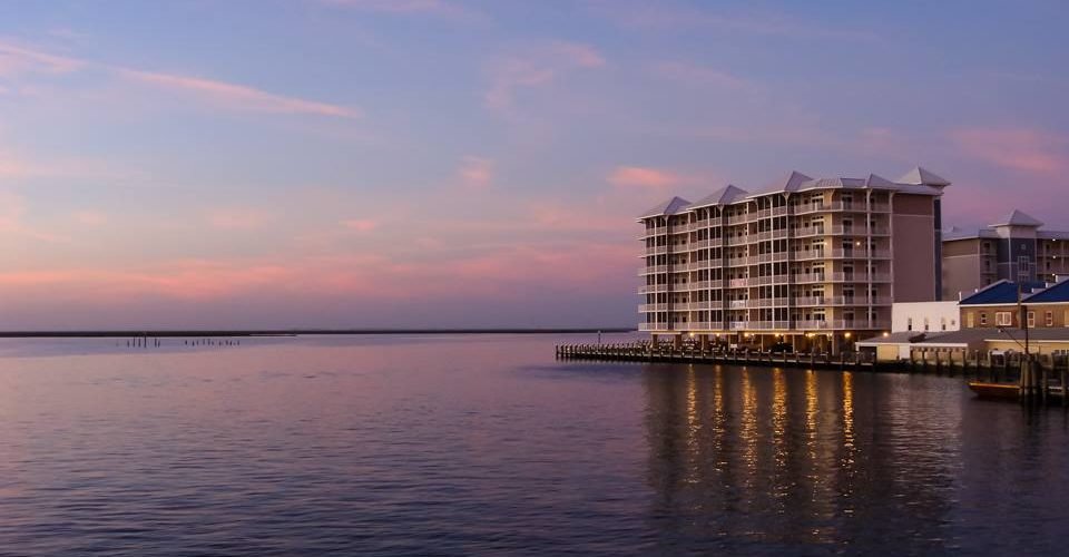 Condo building in Crisfield MD on the bay at sunset