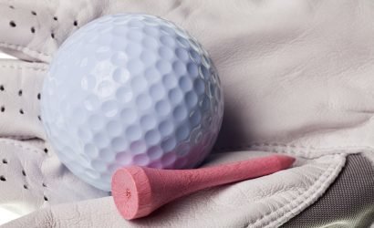 golf ball and pink tee for the ladies day to play golf event